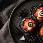 Halloween Pasta Appetizers hero: eyeball spaghetti with marinara, pesto and basil.